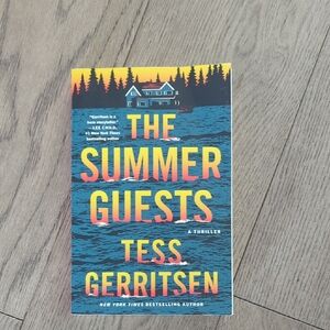 The Summer Guests by Tess Gerritsen - Bright Blue & Yellow Paperback